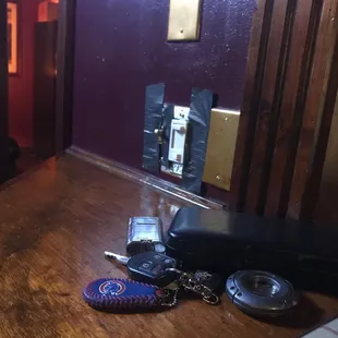 keys, wallet, and phone on the floor
