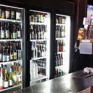 a bar with beer bottles