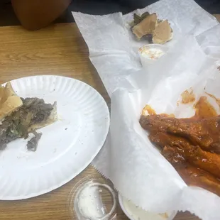 Sals Special Steak on garlic bread and Mild Buffalo Wings.