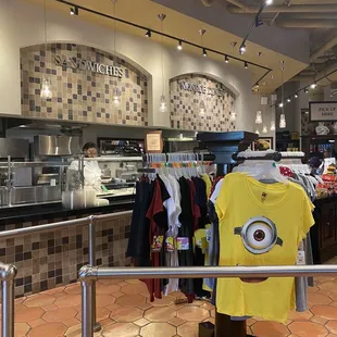 a yellow t - shirt with a minion on it