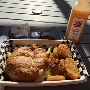 Bacon, egg, &amp; cheese croissant with hash browns