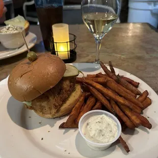 Fried mahi mahi sandwich with sweet potato fries. Delicious!