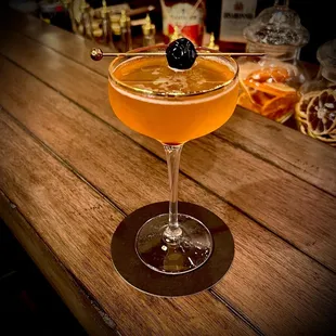 a cocktail in a coupe glass