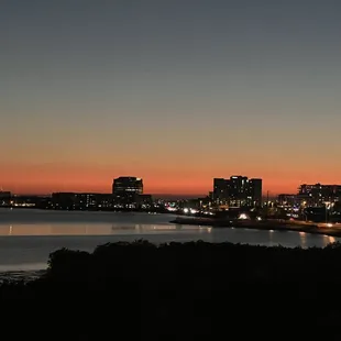 a view of a city at dusk