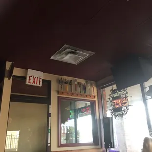 the exit sign above the counter