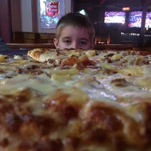 12" or 16" pizzas, with up to 12 different toppings. Takeout or dine-in.