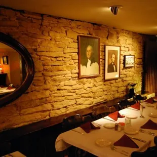 a dining table with place settings