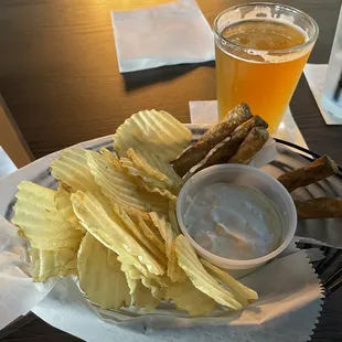 Solid onion dip with pretzels and chips, goes well with beer