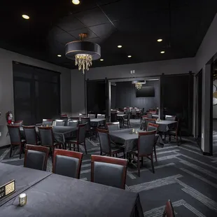 a dining room with tables and chairs