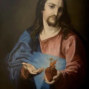 Sacred Heart of Jesus painting in the Main Bedroom of the 1850 House of the Louisiana State Museum