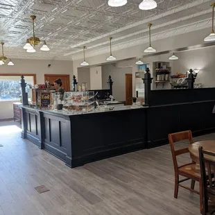 a coffee shop with a large counter