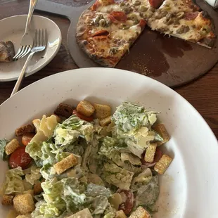 Overdressed Caesar and disappointing pizza.
