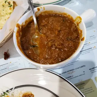 Partially consumed josh rogan lamb curry