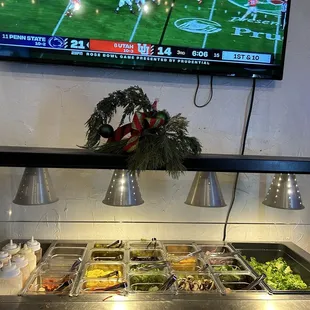 a television and salad bar