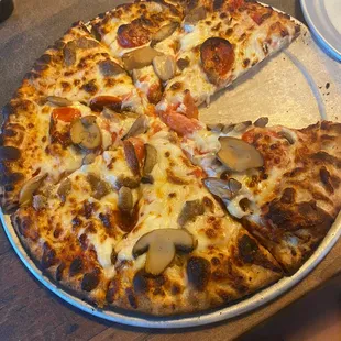 Sausage, pepperoni, &amp; mushroom pizza