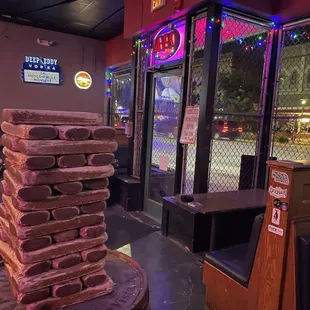 a stack of rocks in front of a bar
