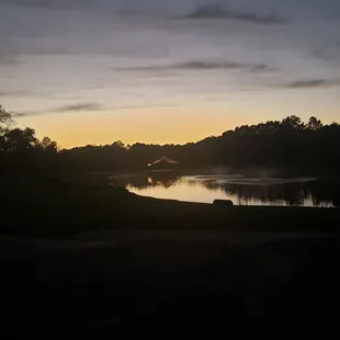 a view of a lake at sunset