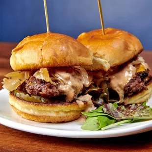 two burgers on a plate