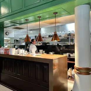 Kitchen and counter inside Cafe 1886.