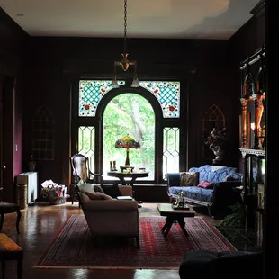 View of the front room from the library, formerly a gentlemen&apos;s smoking room.