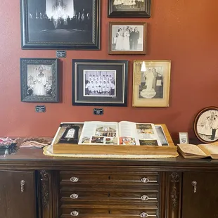 a desk with a book on top of it