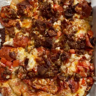 a close up of a pizza in a box