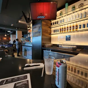 a view of a bar with a television