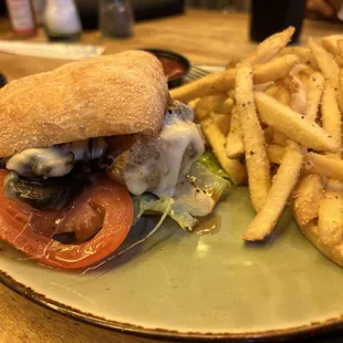 a burger and fries on a plate