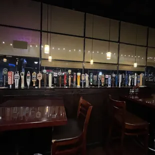 a row of beer taps