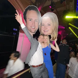 a man and a woman posing for a picture