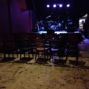 35 chairs set up for Burlesque Show in front of the stage.