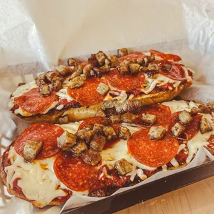 Pipeline pizza grinder - marinara, cheese, pepperoni and sausage on a hoagie roll.  Soo good, must try!
