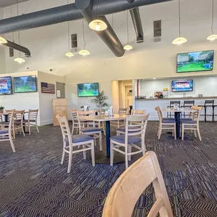Indoor dining area looking toward the bar