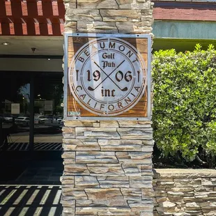 1906 Inc pillar sign