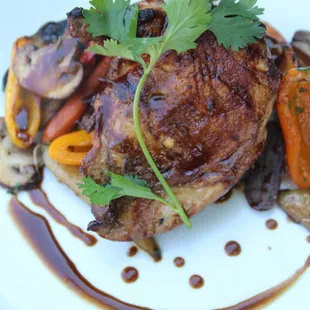 Airline Cut Chicken served with peewee potatoes, pearl onions, mixed chilis, crimini mushrooms and cilantro.  SUMMER 2020 MENU