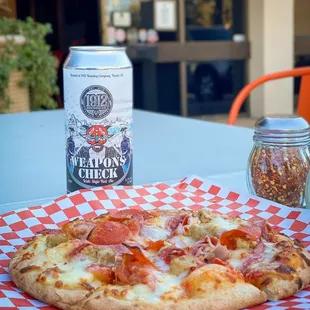 1912&apos;s New Pizza Menu featuring the Meat Lovers Pizza best paired with Weapons Check Irish Red Ale!