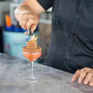 a man making a cocktail