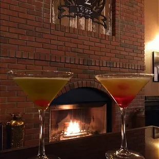 Enjoying some martinis by the super cozy and warm fire.