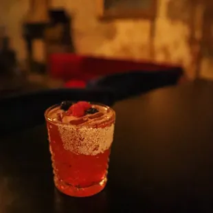 a shot of a drink on a table