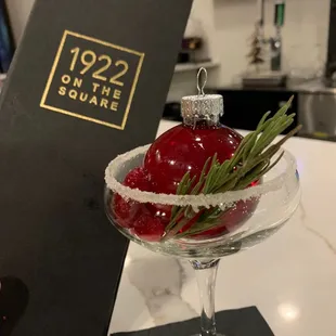 Holiday drink in an ornament, pop the top and pour