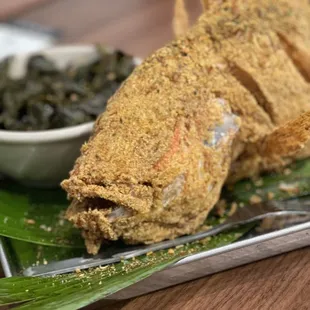 a plate of fried fish