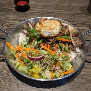 Beef bulgog with fried eggi, side salad