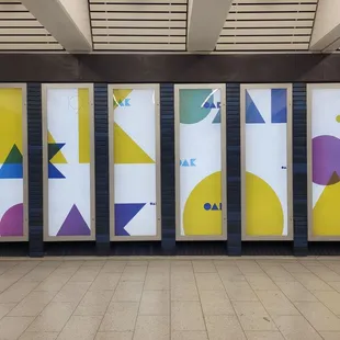 a row of posters with geometric shapes