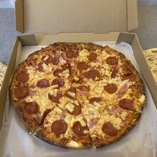 a pizza in a cardboard box