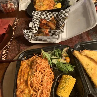 Deep dish Spaghetti, bourbon wings and strawberry cake y'all