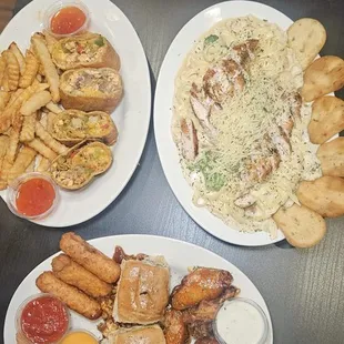 Salmon Wraps, chicken alfredo, and goal sampler.