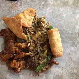 Crab Rangoon, egg roll, orange chicken, beef chop suey and vegetable fried rice