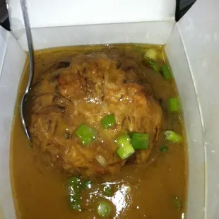 Egg Foo Young. This is a large order of ham EFY and it always has plenty of gravy and garnished with green onion.