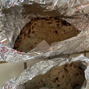 41. Potato Cheese Naan 33. Garlic Naan