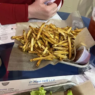 Side of fries with sandwich